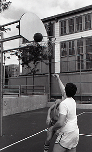 Teenagers playing basketball at Lo Presti Park