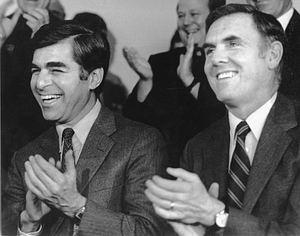 Mayor Raymond L. Flynn and Governor Michael S. Dukakis applauding together