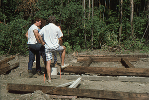 Laying out beams at the Moon Barn Raising Site (3) at entrance to Hopkins Forest on 2 August 1975.
