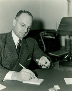 Raymond T. Parkhurst at his desk