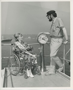 Mrs. Day in the sun on bridge of ship