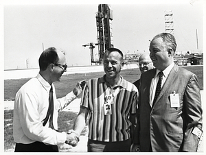 Mayor John F. Collins with Alan Shepard and two unidentified men at Air Force Eastern Test Range, Cape Kennedy (now Cape Canaveral)