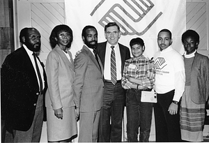 Mayor Raymond L. Flynn posing with Kellie Belfield and other unidentified representatives of the Roxbury Boys & Girls Club