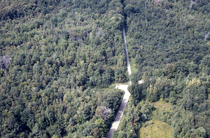 Aerial oblique view west at the intersection of Shoen's driveway and Northwest Hill Road on 2 Sept 1971.