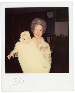 Deolinda Mello, holding granddaughter, Elena