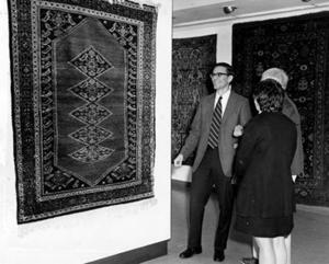 Three People viewing Exhibition of "Ancient & Oriental Rugs"