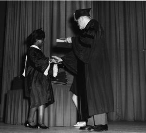 A student receiving her degree at the 1969 Suffolk University commencement