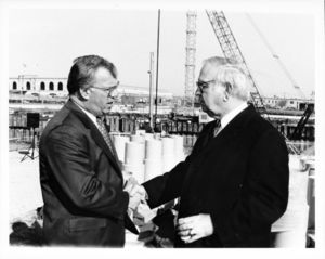 Tour of the Ted Williams Tunnel in Boston, Mass: John Joseph Moakley (right), shaking hands with Thomas M. Menino (left)