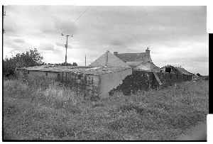Outbuildings in Co. Tyrone where two PIRA men were ambushed and shot dead by the SAS. Bullet holes in the corrugated iron roof are marked in chalk by the army