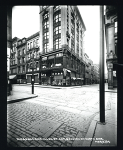 Buildings east side Washington Street, corner of Bedford Street, north side