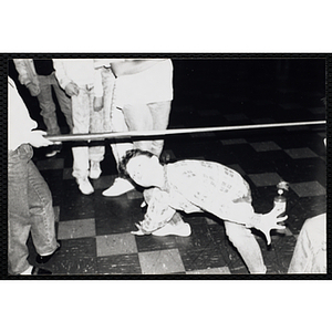 A Girl participating in a limbo contest