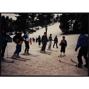 A group of children take ski instruction at Nashoba Valley