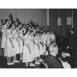 Nursing students in uniform at pining ceremony