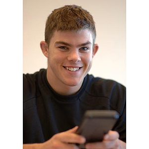 Torch Scholar Joseph Bordieri smiles in class