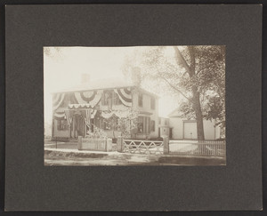 Exterior view of a house decorated for the 250th anniversary in Medfield, Mass., June 6, 1901