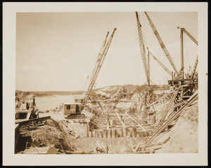 Steam cranes working on the construction of the Cape Cod Canal