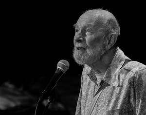 Pete Seeger at the microphone on the Earth Day concert