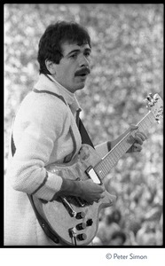 Carlos Santana performing at Bill Graham's SNACK (Students Need Athletics, Culture and Kicks) benefit concert, Kezar Stadium