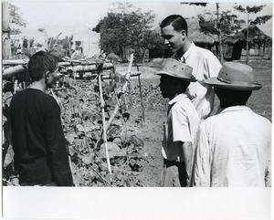 David Entin talking with farmers
