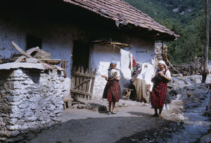 Women spinning wool