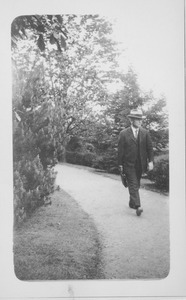 F. A. Waugh walking along a path