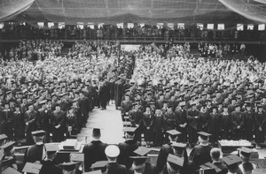 Graduates file into Curry Hicks Cage for commencement exercises