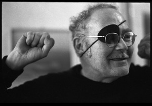 W. Eugene Smith: close-up portrait, raising his fist