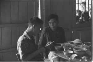 Captain Chinh interrogating Nguyen Van Bang; Saigon.
