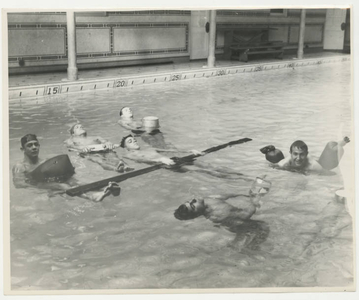 Soldiers floating in McCurdy Natatorium (1942)