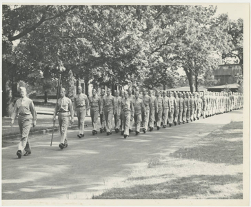 Army Air Corps marching down road (May 1943)