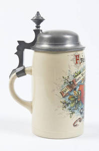 A Pottery stein with two shields