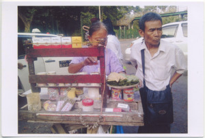 A photograph of Htu Htu Paw's father buying betel nuts in Burma, 2015