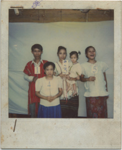 A photograph of Le Say and her family for a United Nations Identification picture in Mae La Oon refugee camp, Thailand, 1997