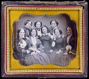 Group portrait of eight adult females