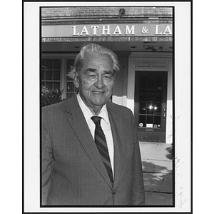 Man standing outside a storefront