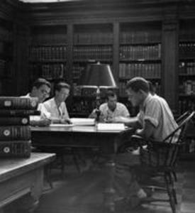 Students studying in the Stetson Library reading room
