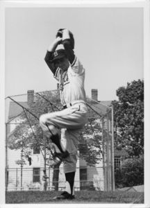 Suffolk University men's baseball pitcher prepares for a pitch, 1963