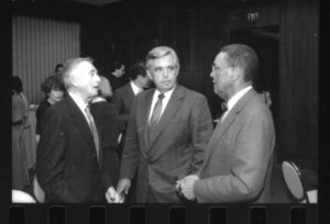 Suffolk University Trustee Lawrence Cameron and other attendees at an event honoring President Daniel H. Perlman (1980-1989)