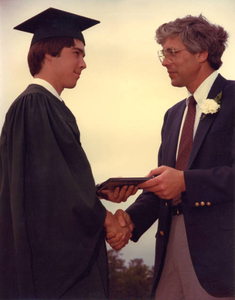 Receiving my high school diploma from my dad