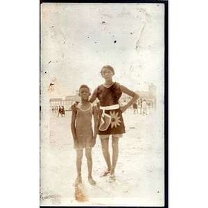 An African American women and a young boy at the beach