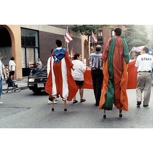 Boys on stilts walking in the 1998 Festival Betances parade.