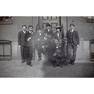 Group photograph, eight boys on stoop including Charles H. Bruce