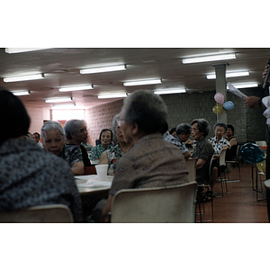 Elderly women attend a celebration for the Chinese Resident Association