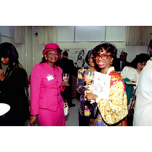 Three African-American women standing together at the African American Institute dedication