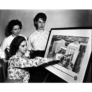 Northeastern women review the design for a proposed women's dorm