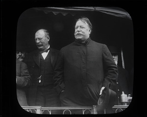 William Howard Taft (right) standing next to unidentified man