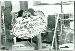 Sarabeth with her new sign for Sarabeth's Kitchen