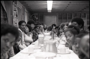 Inner City Round Table of Youth campers:group of African American campers at dining table (adults at end)
