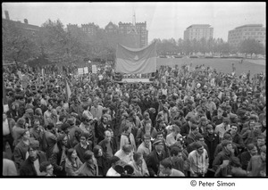 MIT war research demonstration: demonstrators gathered around an NLF flag