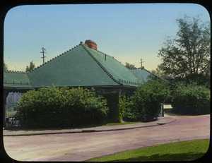 Train station with green-shingled roof